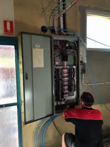 man completing power board building